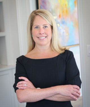 Headshot of Jamie Gerrard wearing black dress